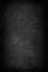 Black background, dark slate texture.