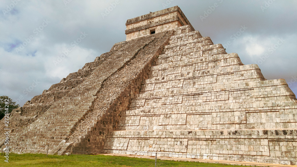 Mayan Pyramid of Chichen Itza on a cloudy day, Mexico