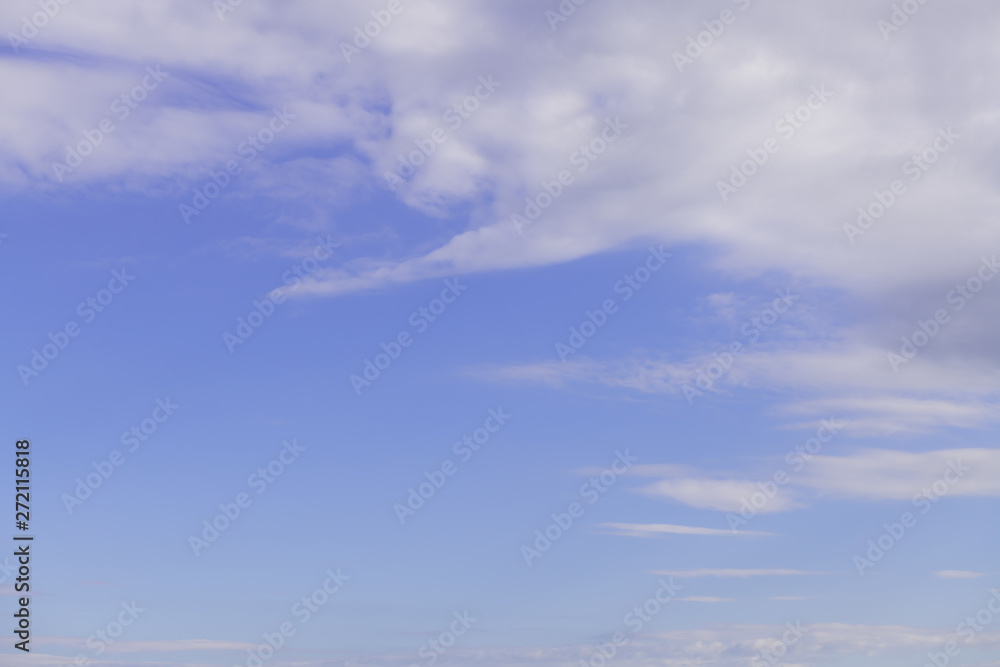 Summer blue sky with soft white clouds background