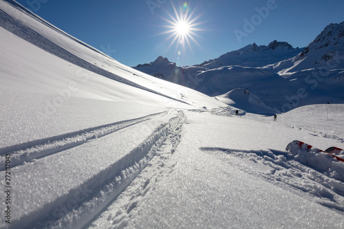 Ski tracks on the mountain side close to ski track