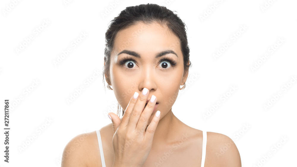 Beautiful girl with expressive emotions. Young beauty asian woman. Shocked. Isolated on white background Beautiful girl with expressive emotions. Young beauty asian woman. Shocked. Isolated on white background