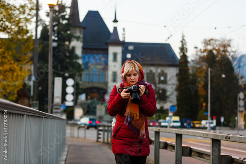 Street view with red tram in the old town of Bern city. Bern, Switzerland photo