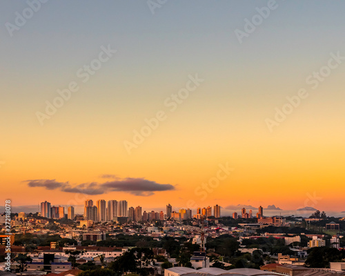 Cityscape with a golden sunrise