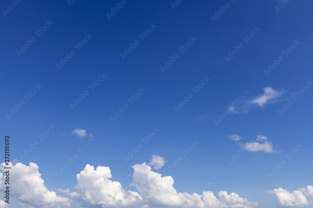 Summer blue sky with soft white clouds background Summer blue sky with soft white clouds background