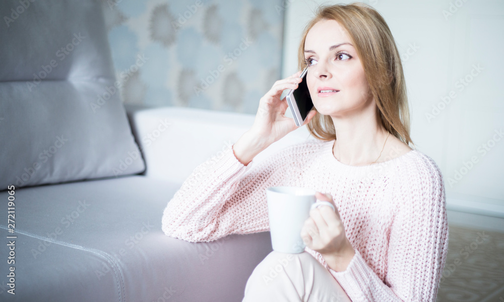 woman talking on mobile phone at home woman talking on mobile phone at home