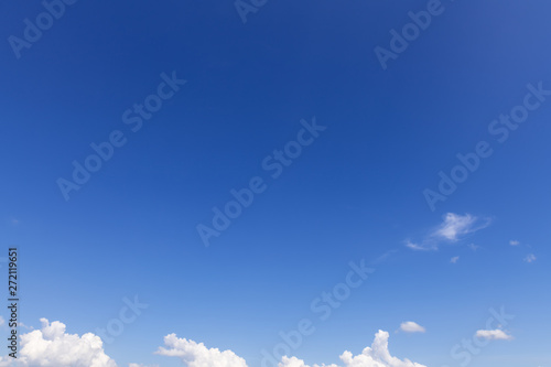 Summer blue sky with soft white clouds background
