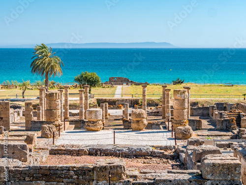 Ancient Romans ruins of Baelo Claudia, next to the beach of Bolonia, near Tarifa in Cadiz in the south of Spain. photo