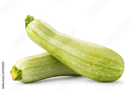 Two fresh zucchini on a white background, isolated.