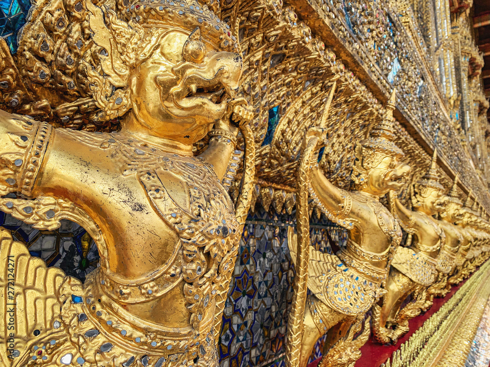 Golden garuda statue in Thailand dynasty temple.