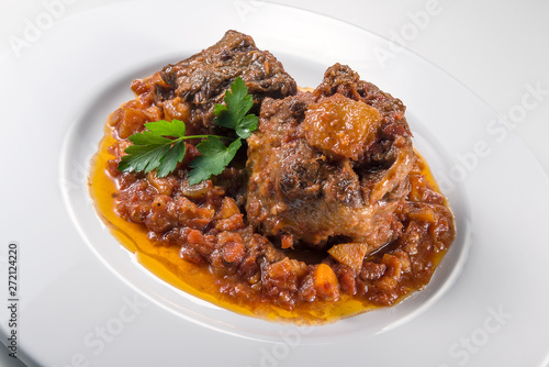 Dish with portion of oxtail stewed © antoniotruzzi