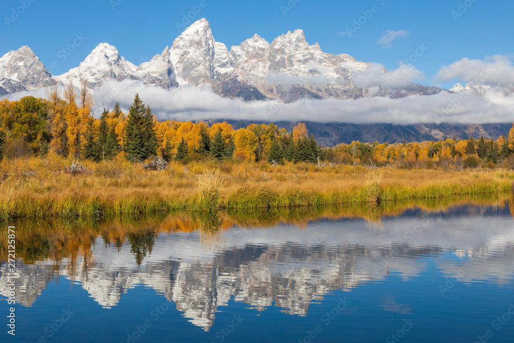 Scenic Reflection of the Teton Range in Autumn