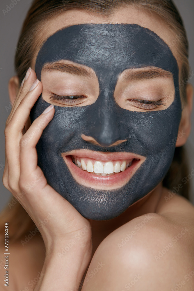 Beauty face skin care. Woman with cosmetic spa facial mask Beauty face skin care. Woman with cosmetic spa facial mask