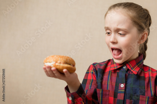 Petty Little Girl eating burger, following fastfood - Image