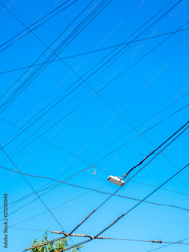 Wired with clear blue sky