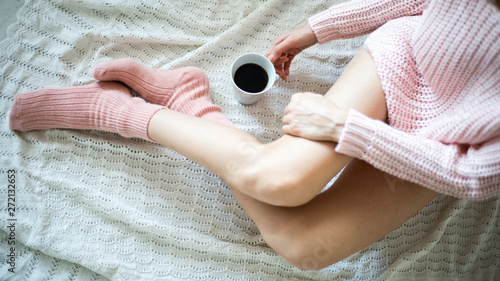 girl in bed with cup off coffe