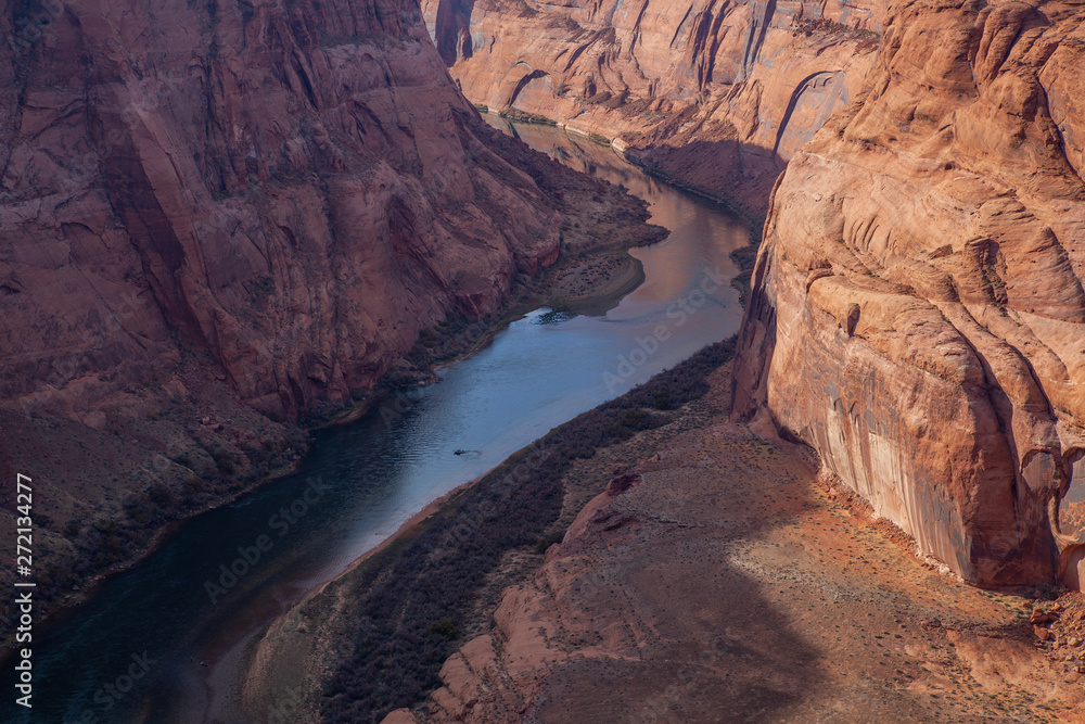 boat on colorado river in horseshoe bend