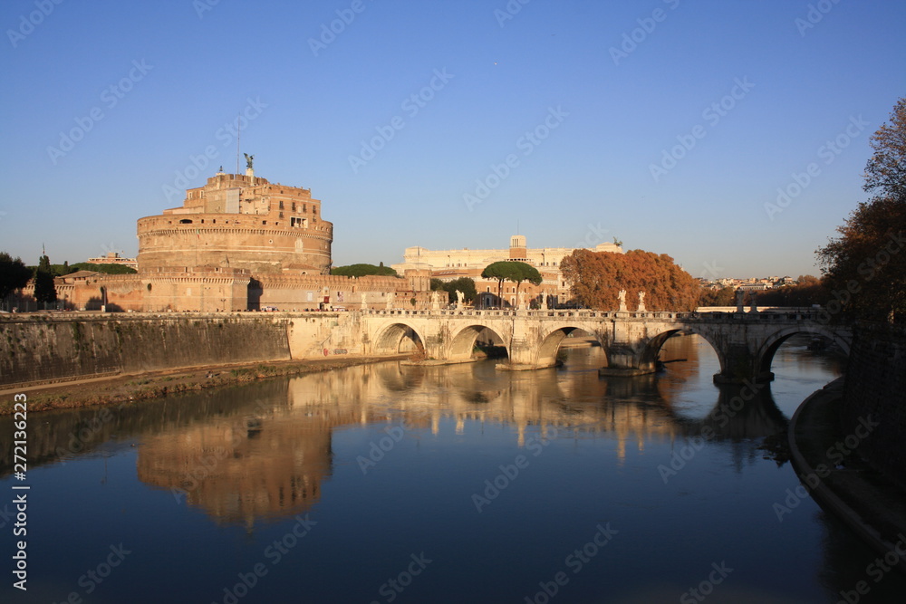 Rome, an ancient building reflected in the water on a sunny day