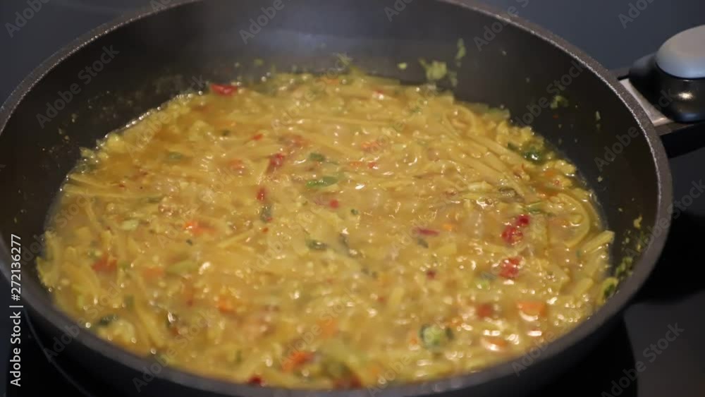 Time-lapse bakmi goreng cooking in a pan Time-lapse bakmi goreng cooking in a pan