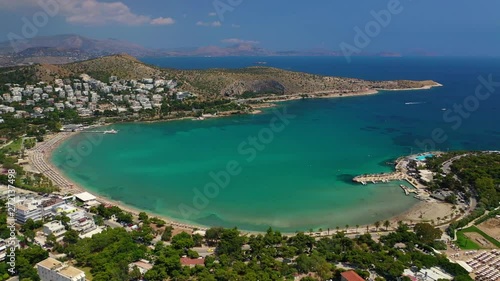 Wallpaper Mural Aerial drone bird's eye video of famous celebrity sandy beach of Astir or Asteras in south Athens riviera with turquoise clear waters, Vouliagmeni, Greece Torontodigital.ca