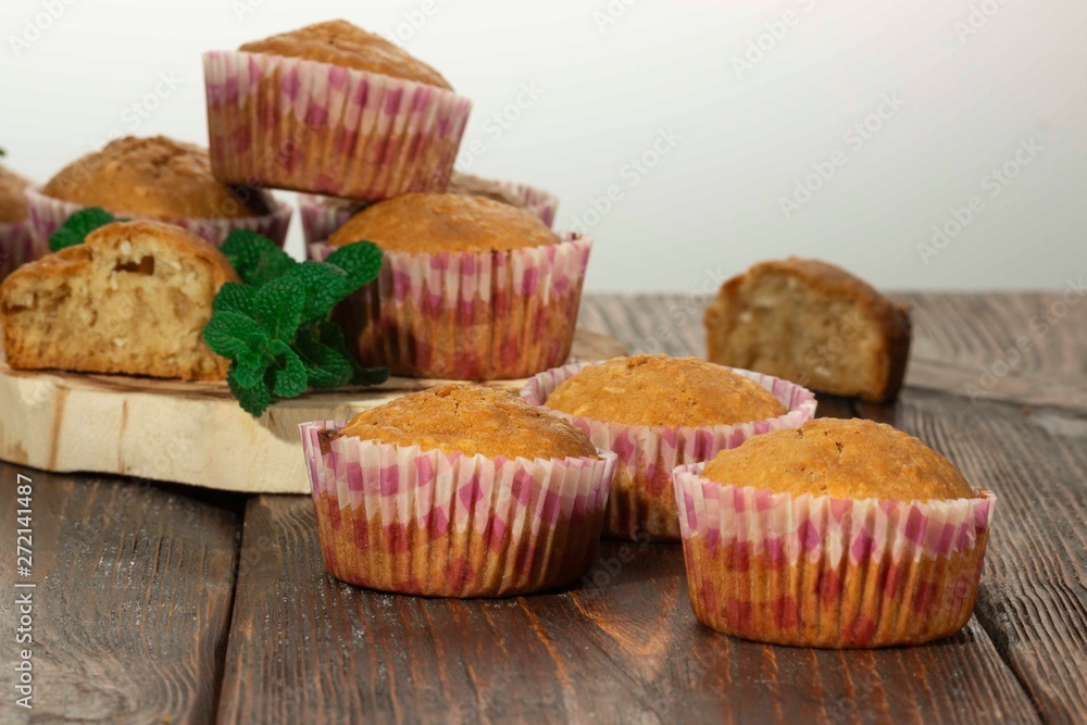 Vanilla cupcake, homemade pastry on wooden background Vanilla cupcake, homemade pastry on wooden background