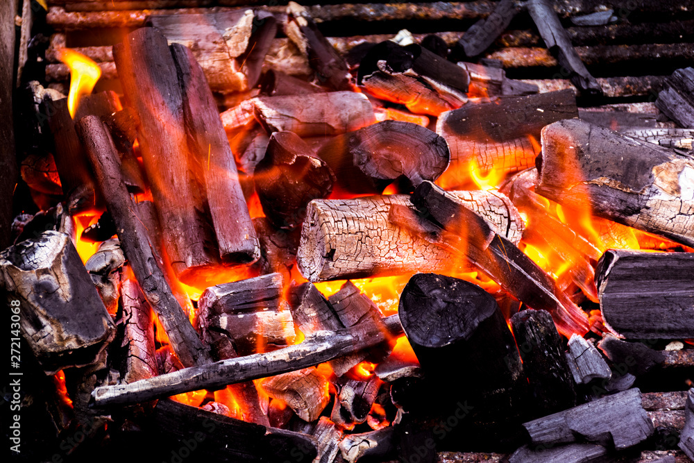 Close up charcoal ash fire burning hot Close up charcoal ash fire burning hot