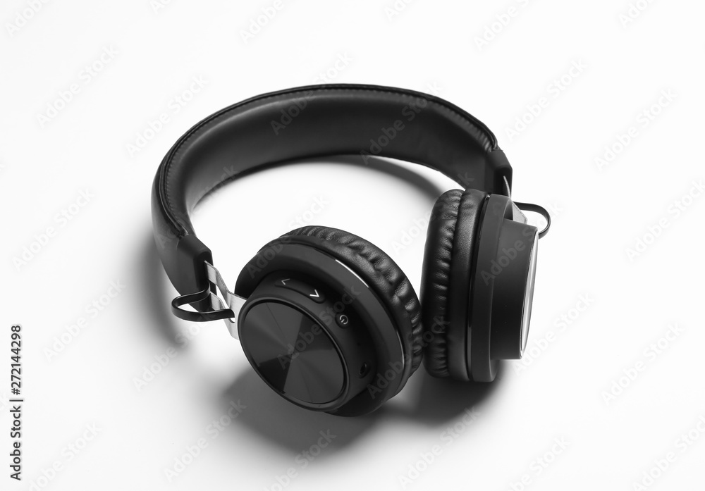 Stylish modern wireless headphones on white background Stylish modern wireless headphones on white background