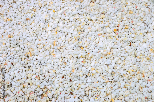 White pebble stone texture on the ground. -