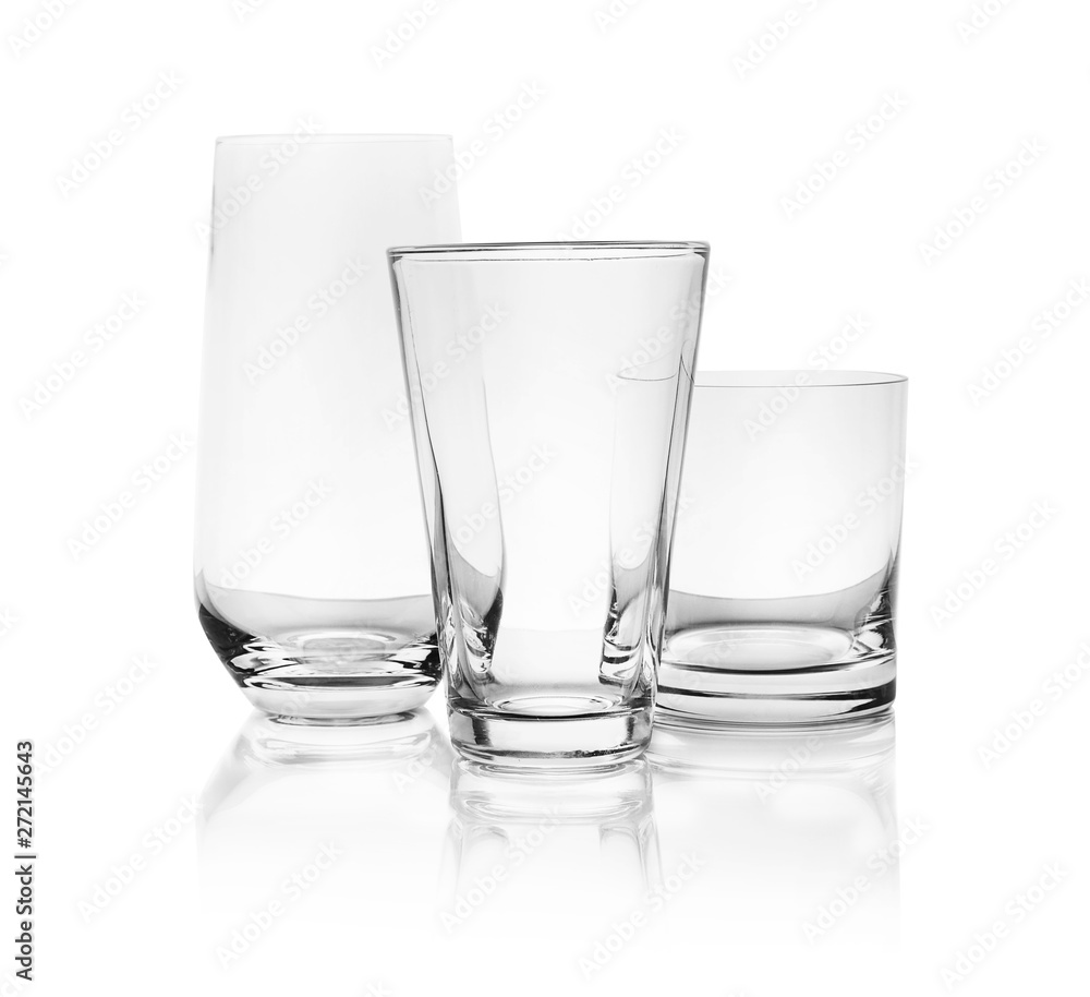 Set of empty glasses for different drinks on white background Set of empty glasses for different drinks on white background