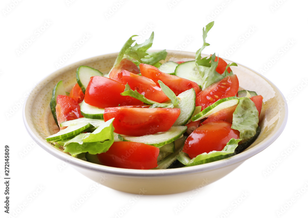 Delicious fresh cucumber tomato salad in bowl on white background Delicious fresh cucumber tomato salad in bowl on white background