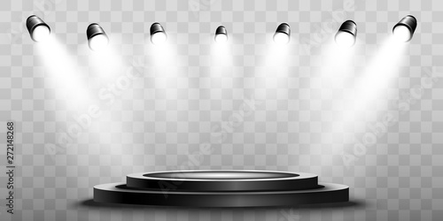 Round podium, pedestal or platform, illuminated by spotlights in the background. 