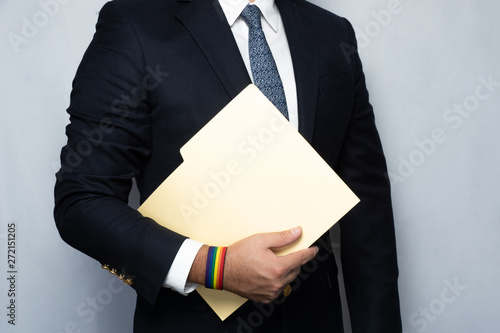Gay businessman and folder