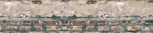 Panorama old damaged brick wall with shabby plaster.