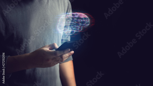 social media smartphone with man who use for connect to online people for internet business with ai robot brain cpu processor, deep learning future hologram