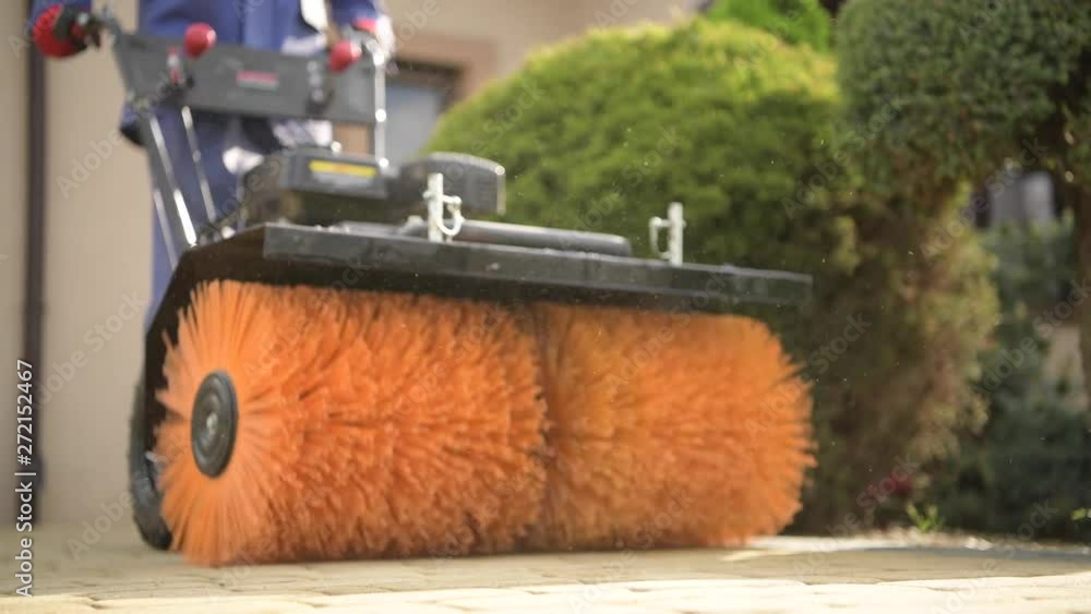 Cleaning Residential Brick Pavement Using Gasoline Power Brush Equipment Cleaning Residential Brick Pavement Using Gasoline Power Brush Equipment