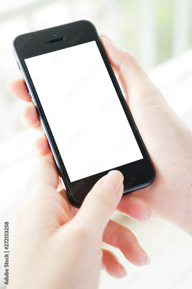 Woman typing on mobile phone isolated white screen Woman typing on mobile phone isolated white screen