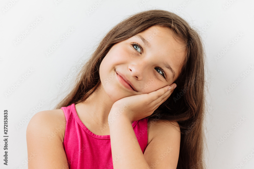 Dreamy,pleased, thinking emotion . Wish concept. 9 year girl face portrait on white backgound. Dreamy,pleased, thinking emotion . Wish concept. 9 year girl face portrait on white backgound.