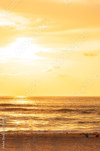 Glowing sunset over a tropical beach.