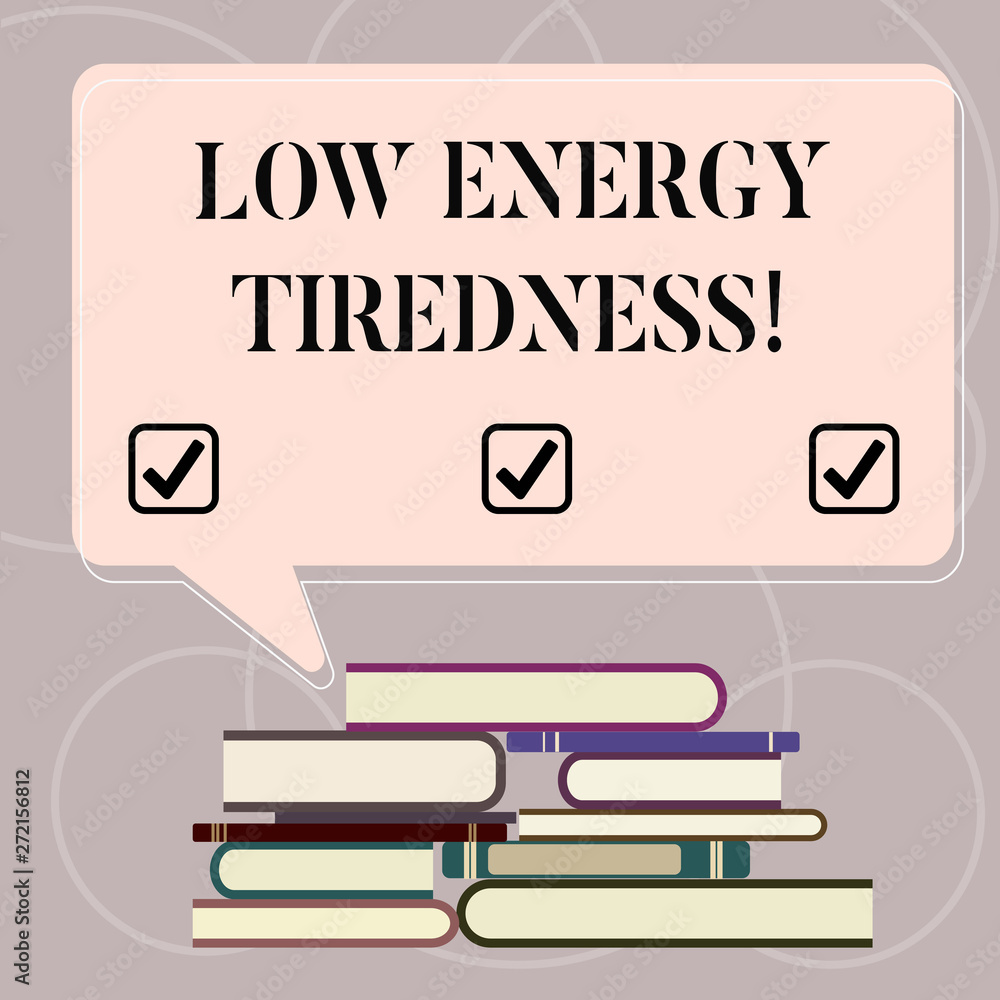 Fototapeta premium Word writing text Low Energy Tiredness. Business concept for subjective feeling of tiredness that has gradual onset Uneven Pile of Hardbound Books and Blank Rectangular Color Speech Bubble