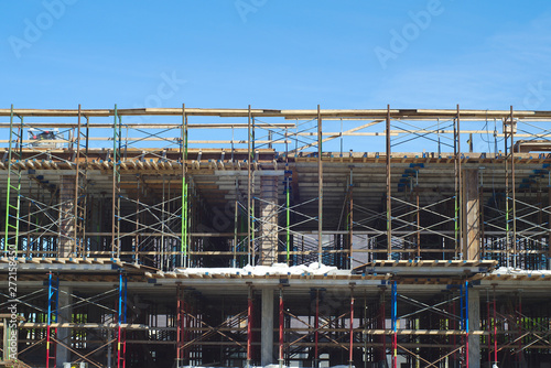 construction site metal beams structure workplace scaffold