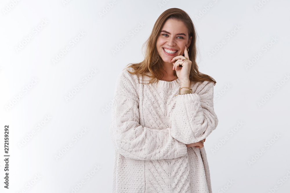 Wellbeing, lifestyle concept. Gorgeous carefree smiling caucasian woman laughing happily touching cheek index finger, tilting head amused having fun joking, expressing positivity, white background Wellbeing, lifestyle concept. Gorgeous carefree smiling caucasian woman laughing happily touching cheek index finger, tilting head amused having fun joking, expressing positivity, white background