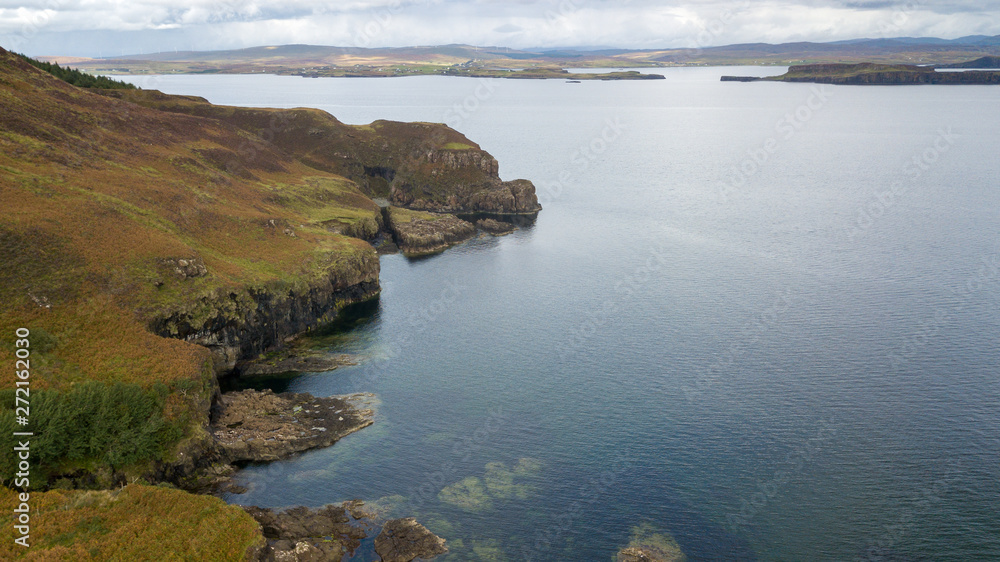 Aerial views from a drone of the beautiful shorelines in the Isle of Skye, Scotland.