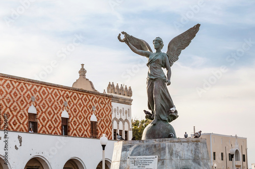 27 May 2019, Rhodes, Greece: Angel statue of victory in Mandraki harbor in old town of Rodos