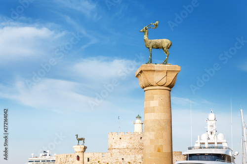 Famous tourist destination in Mandraki port with deers statue, where The Colossus was standing. Rhodes, Greece
