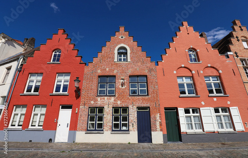 Street view with traditional medieval houses in Bruges , Belgium photo