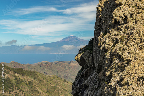 Snowy peak of volcano Teide, Tenerife. View from the Island La Gomera, Los Roques rocks.