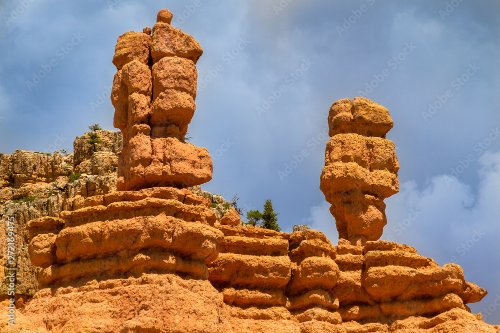 Two Pillars at Bryce Canyon and view with colorful rocks, skies and distance