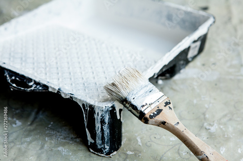 White paint, brush and tray, for painting white ceiling or trim