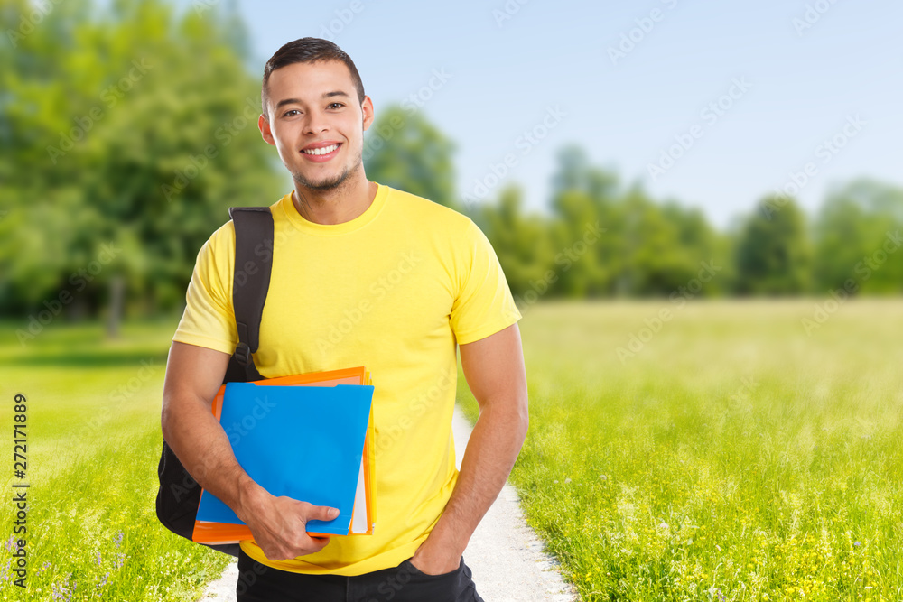 Student young man outdoor park learning copyspace copy space smiling people