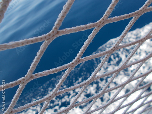 rope on a blue sea background