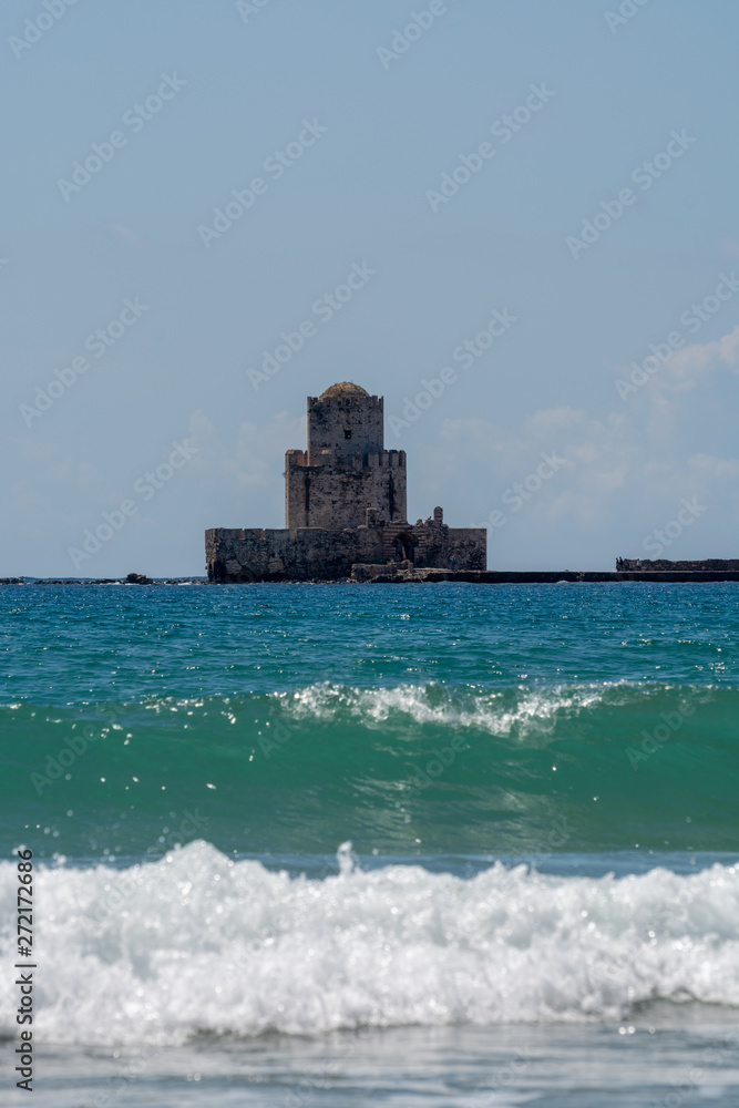 Old tower in fort and historical castle in ancient picturesque town Methoni on Peloponnese, Greece, tourist destination